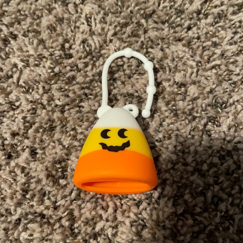 Hand sanitizer holder